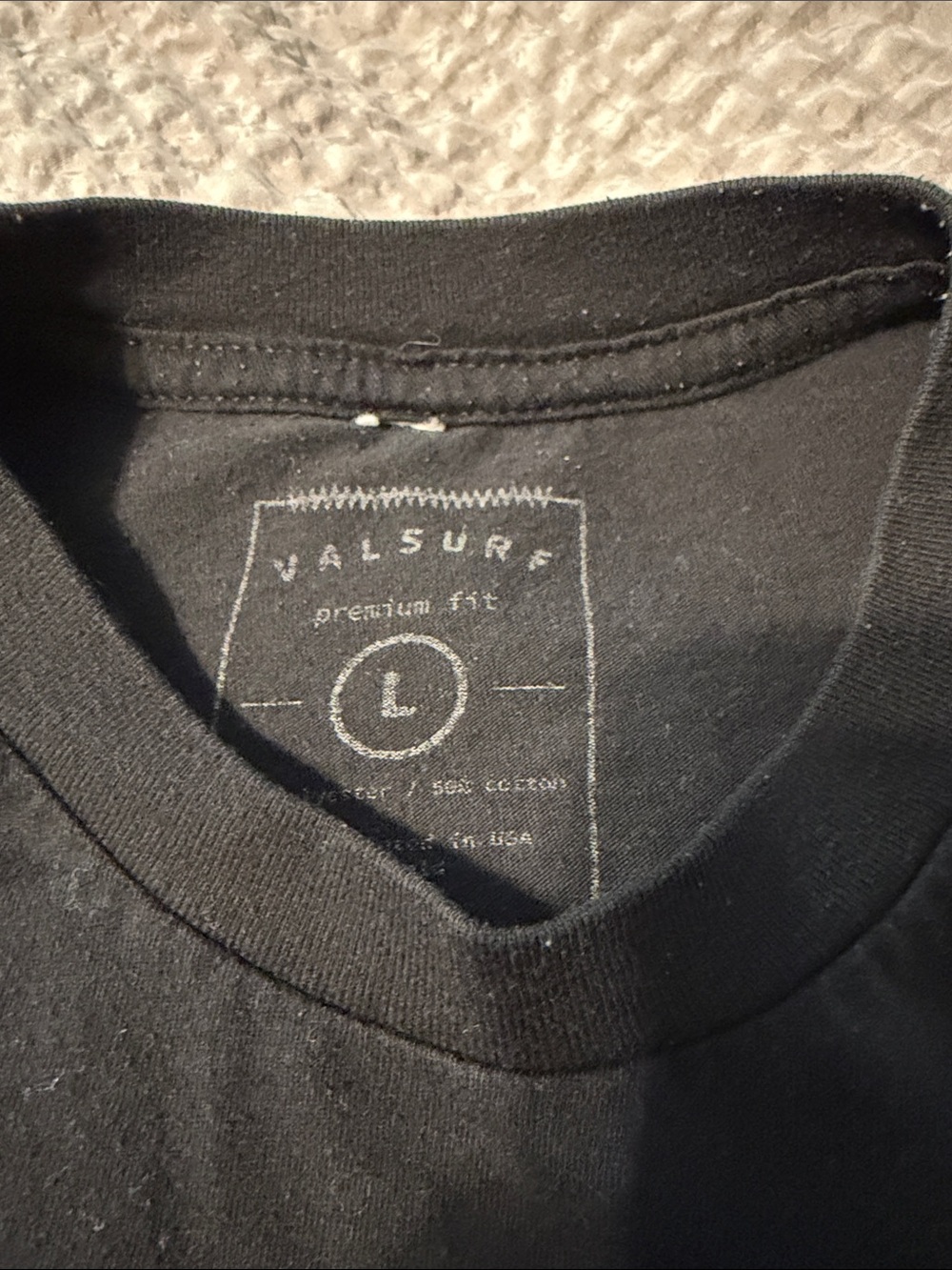 Black Short-Sleeve Graphic Tee with Pink Chest Emblem - Picture 2 of 3